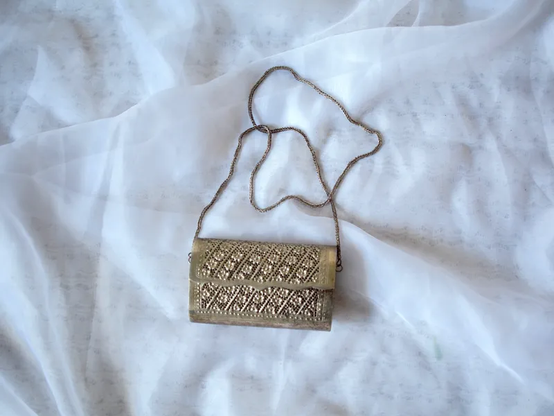 Bolso clutch metálico, foto 1 de 2